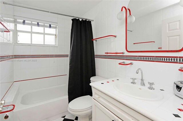 15007 SW 141st Pl, Miami, FL 33186 - bathroom featuring tile walls, toilet, shower / bath combo, vanity, and tasteful backsplash