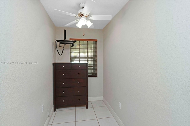 15007 SW 141st Pl, Miami, FL 33186 - spacious closet with light tile patterned flooring and a ceiling fan