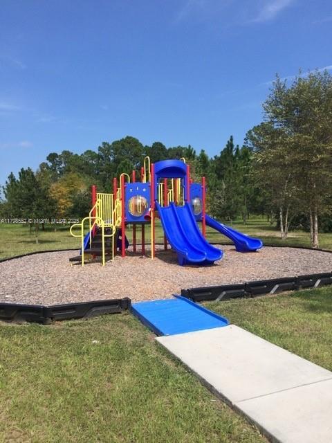 15007 SW 141st Pl, Miami, FL 33186 - communal playground featuring a lawn