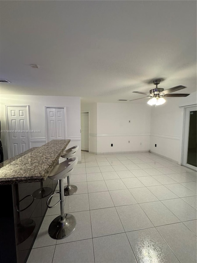 10331 SW 20th Ter, Miami, FL 33165 - living room with light tile patterned flooring and a ceiling fan