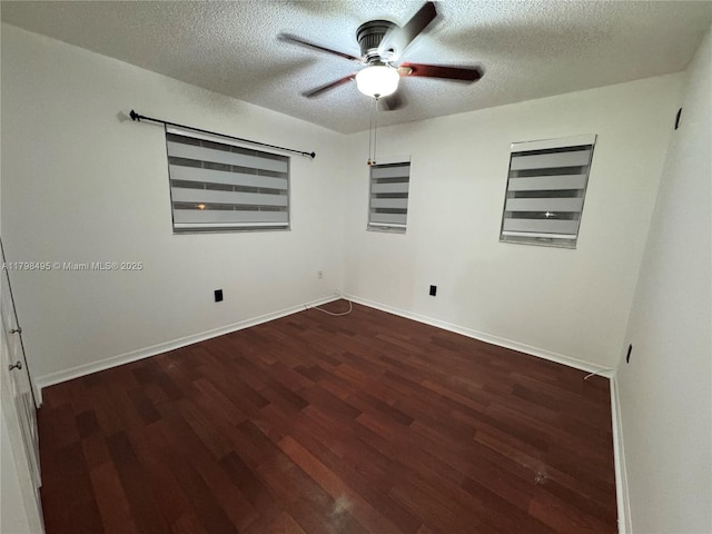 10331 SW 20th Ter, Miami, FL 33165 - spare room with wood finished floors, a ceiling fan, a textured ceiling, and baseboards