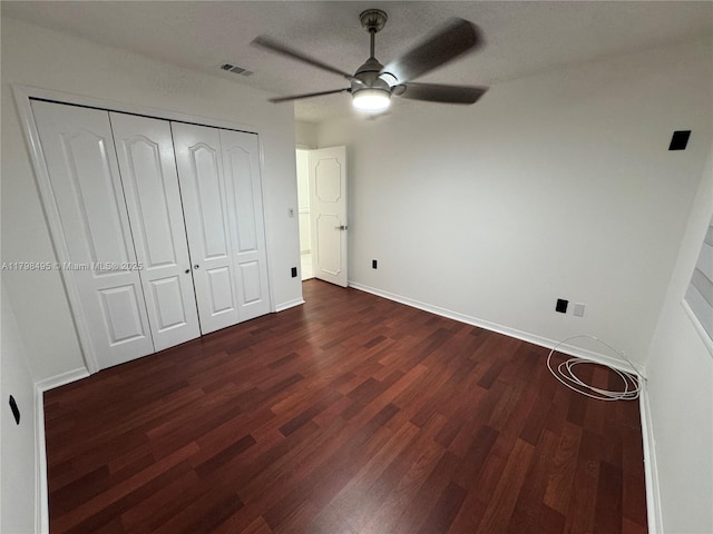 10331 SW 20th Ter, Miami, FL 33165 - unfurnished bedroom featuring dark wood-type flooring, a closet, baseboards, and ceiling fan