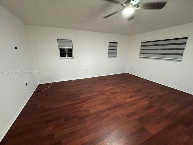 10331 SW 20th Ter, Miami, FL 33165 - spare room with a ceiling fan, dark wood finished floors, and baseboards