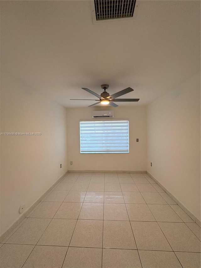 10331 SW 20th Ter, Miami, FL 33165 - unfurnished room featuring a wall mounted AC, ceiling fan, light tile patterned floors, and baseboards