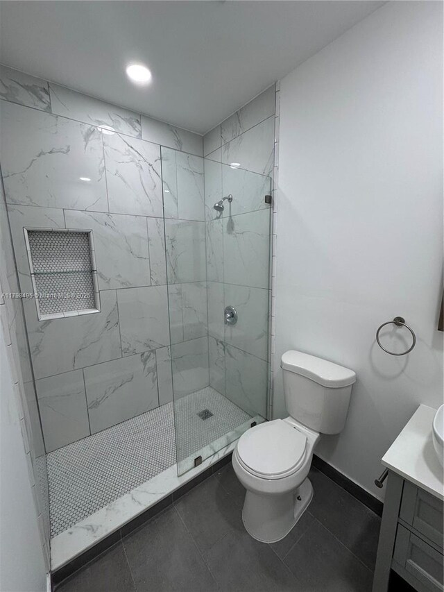 10331 SW 20th Ter, Miami, FL 33165 - full bath with toilet, a tile shower, vanity, recessed lighting, and baseboards