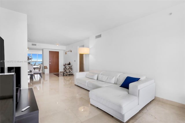 6365 Collins Ave Unit 3202, Miami Beach, FL 33141 - living area with light marble finish flooring
