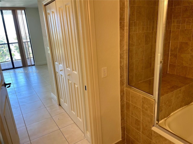 2301 SW 27th Ave Unit 802, Miami, FL 33145 - bathroom featuring tile patterned flooring, a tile shower, plenty of natural light, and a tub