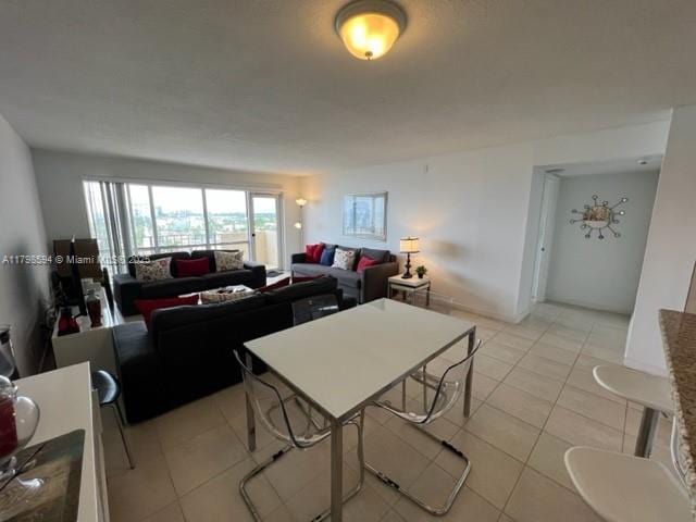 dining space with light tile patterned floors