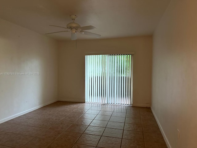 8335 SW 72nd Ave Unit 202D, Miami, FL 33143 - tiled spare room featuring a ceiling fan and baseboards