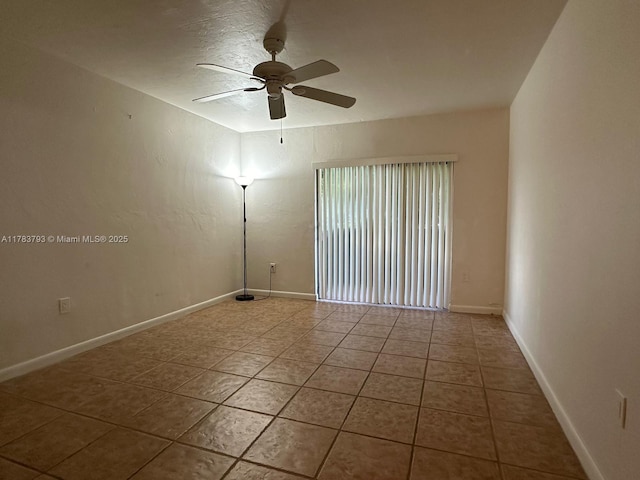 8335 SW 72nd Ave Unit 202D, Miami, FL 33143 - tiled spare room with a ceiling fan and baseboards