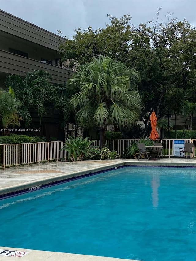8335 SW 72nd Ave Unit 202D, Miami, FL 33143 - community pool featuring fence