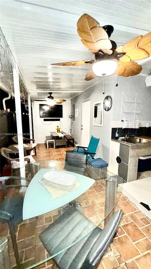 view of patio / terrace featuring a ceiling fan