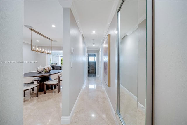 10921 SW 102nd Ct, Miami, FL 33176 - hallway featuring crown molding, recessed lighting, attic access, light marble finish flooring, and baseboards