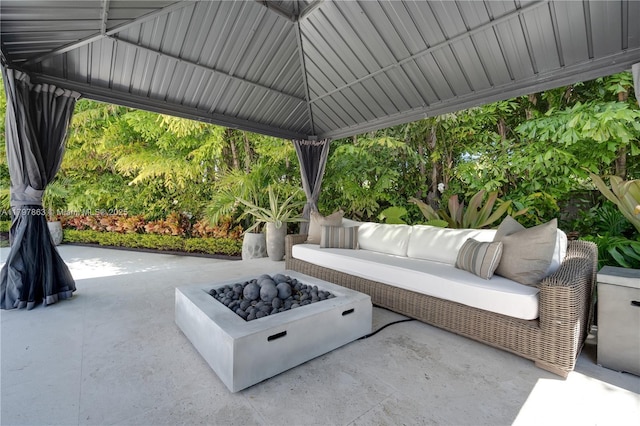 10921 SW 102nd Ct, Miami, FL 33176 - view of patio featuring an outdoor living space with a fire pit and a gazebo