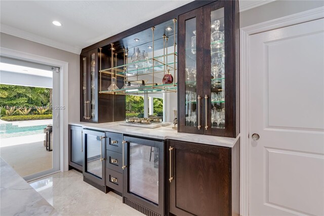 10921 SW 102nd Ct, Miami, FL 33176 - indoor bar with wine cooler, ornamental molding, recessed lighting, and light marble finish floors