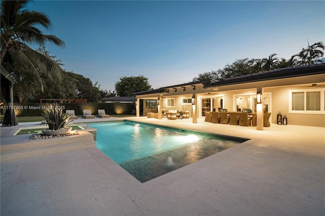 10921 SW 102nd Ct, Miami, FL 33176 - view of swimming pool with a patio and outdoor lounge area