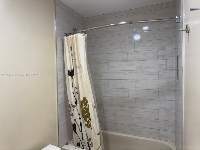 full bathroom with shower / bath combination with curtain