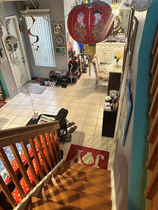 stairs with tile patterned floors