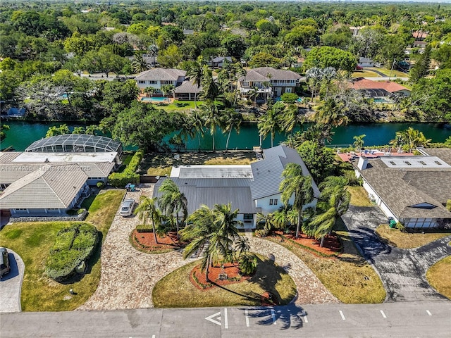 aerial perspective of suburban area featuring a large body of water