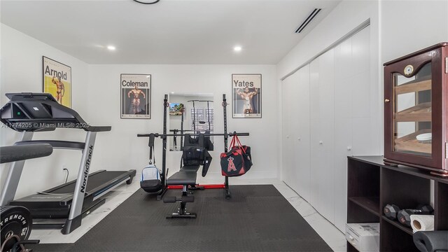 exercise area with recessed lighting