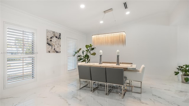 office with healthy amount of natural light, baseboards, crown molding, recessed lighting, and light marble finish floors