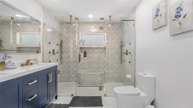 full bath with marble finish floors, toilet, double vanity, and a walk in shower