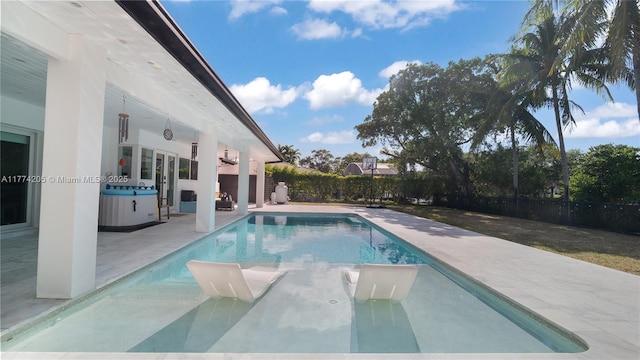 view of pool featuring a patio and a fenced backyard