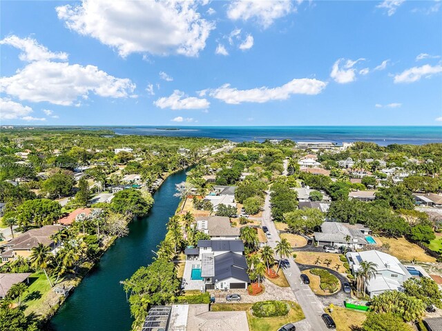 aerial perspective of suburban area featuring a large body of water