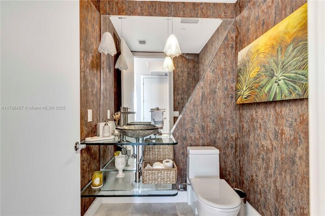 15811 Collins Ave Unit 2506, Sunny Isles Beach, FL 33160 - half bath featuring toilet and a sink