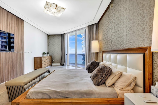 15811 Collins Ave Unit 2506, Sunny Isles Beach, FL 33160 - bedroom with wallpapered walls and access to exterior