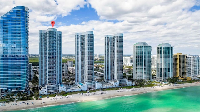 15811 Collins Ave Unit 2506, Sunny Isles Beach, FL 33160 - drone / aerial view of expansive beach and a view of skyline