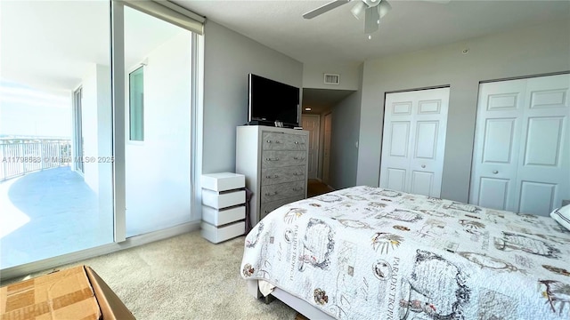 1745 E Hallandale Beach Blvd Unit 2007W, Hallandale Beach, FL 33009 - bedroom featuring carpet flooring, multiple closets, and a ceiling fan