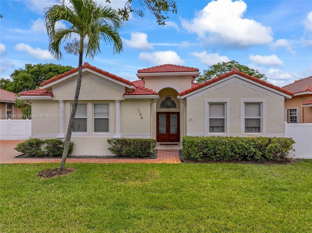 1199 NW 166th Ave, Pembroke Pines, FL 33028 - mediterranean / spanish-style home featuring french doors, stucco siding, and a tiled roof