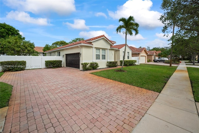 1199 NW 166th Ave, Pembroke Pines, FL 33028 - view of front facade with an attached garage, decorative driveway, stucco siding, and a tiled roof