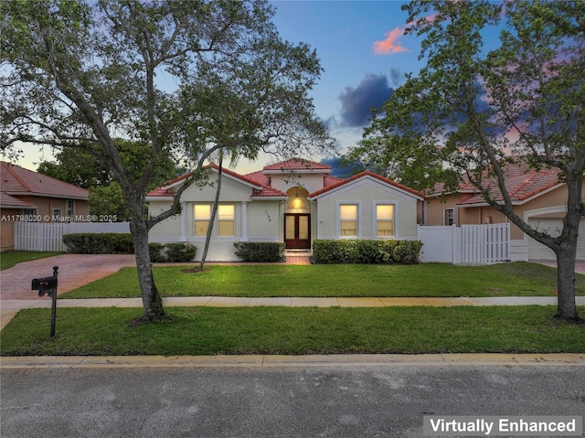 1199 NW 166th Ave, Pembroke Pines, FL 33028 - mediterranean / spanish-style home featuring a tiled roof, driveway, stucco siding, and french doors