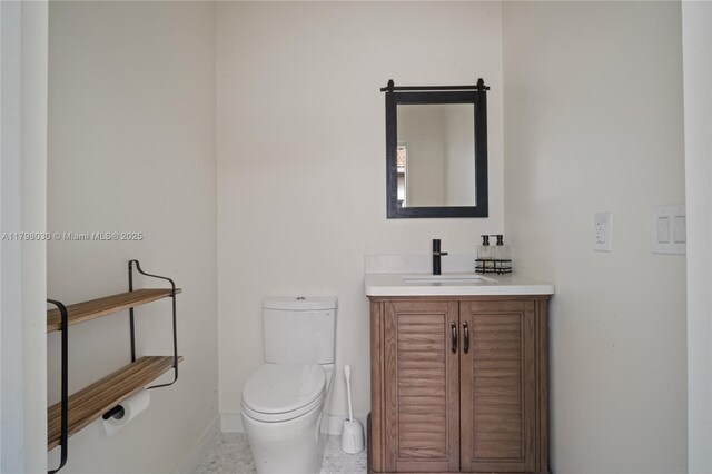 1199 NW 166th Ave, Pembroke Pines, FL 33028 - half bathroom featuring vanity, toilet, and baseboards
