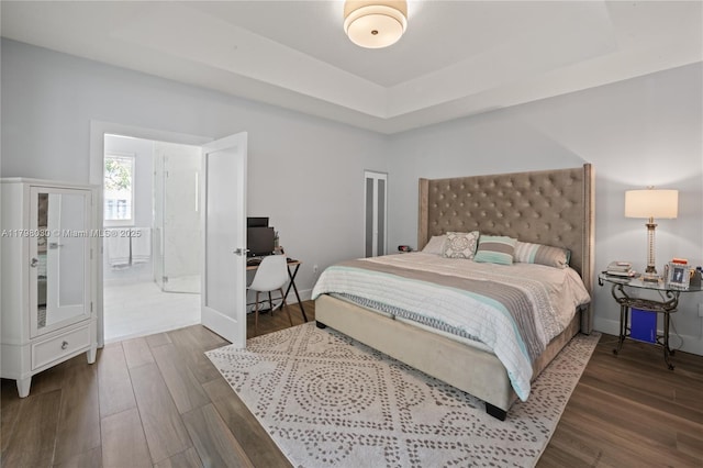 1199 NW 166th Ave, Pembroke Pines, FL 33028 - bedroom with dark wood-style floors, a raised ceiling, an office area, and baseboards