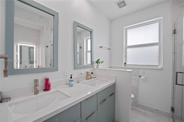 1199 NW 166th Ave, Pembroke Pines, FL 33028 - bathroom featuring marble look tiles, healthy amount of natural light, double vanity, and a marble finish shower