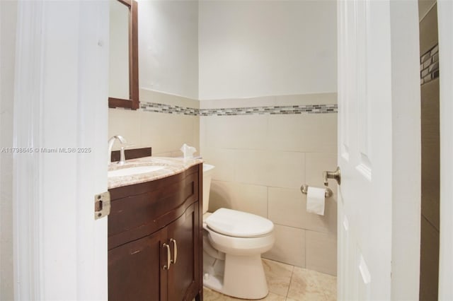 7700 SW 168th Ter, Palmetto Bay, FL 33157 - half bathroom featuring tile walls, vanity, and toilet