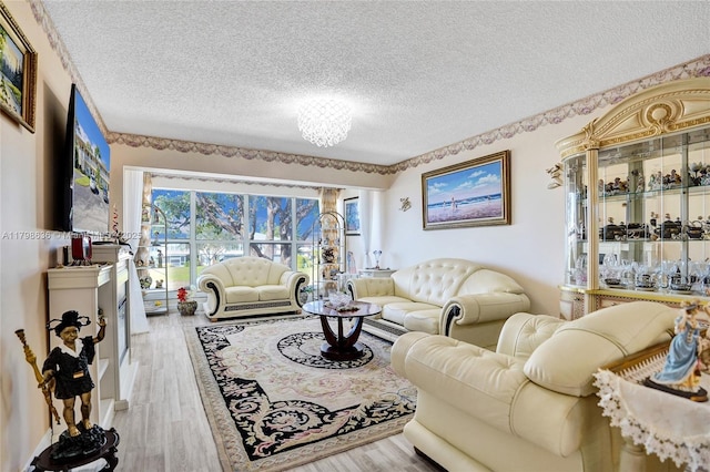 1450 NW 18th Ave Unit 203, Delray Beach, FL 33445 - kitchen with stainless steel dishwasher, a sink, a textured ceiling, decorative backsplash, and light countertops