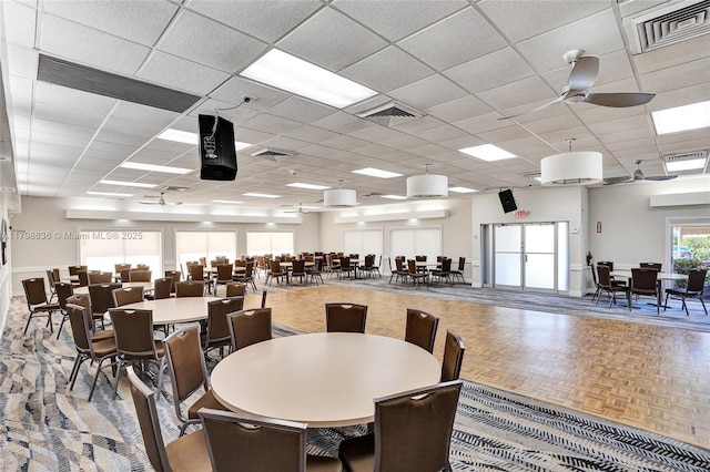 1450 NW 18th Ave Unit 203, Delray Beach, FL 33445 - dining area with a paneled ceiling