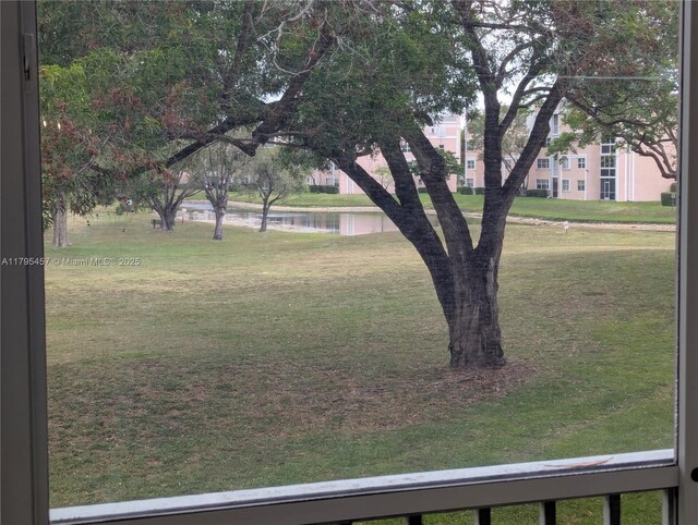 2541 N Nob Hill Rd Unit 205, Sunrise, FL 33322 - view of grassy yard with a water view