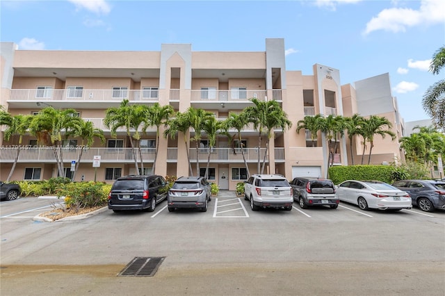 2541 N Nob Hill Rd Unit 205, Sunrise, FL 33322 - view of building exterior with uncovered parking