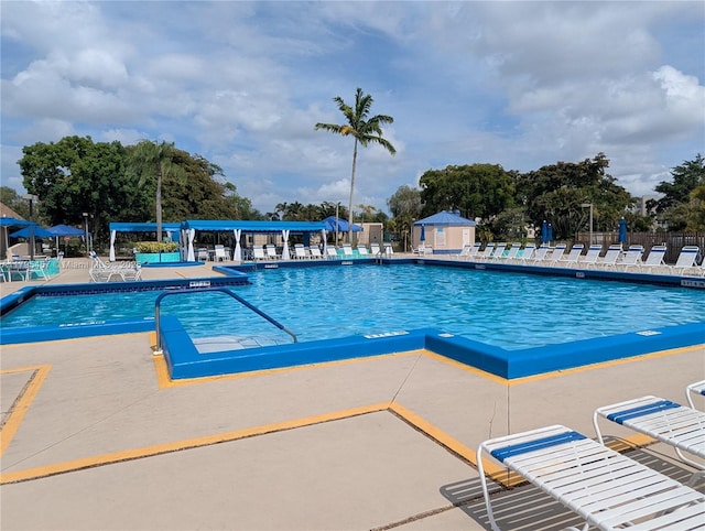 2541 N Nob Hill Rd Unit 205, Sunrise, FL 33322 - community pool with fence and a patio