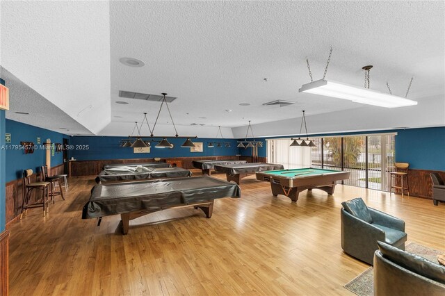 2541 N Nob Hill Rd Unit 205, Sunrise, FL 33322 - playroom with pool table, a textured ceiling, and wood finished floors
