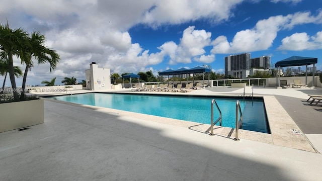 community pool with a patio