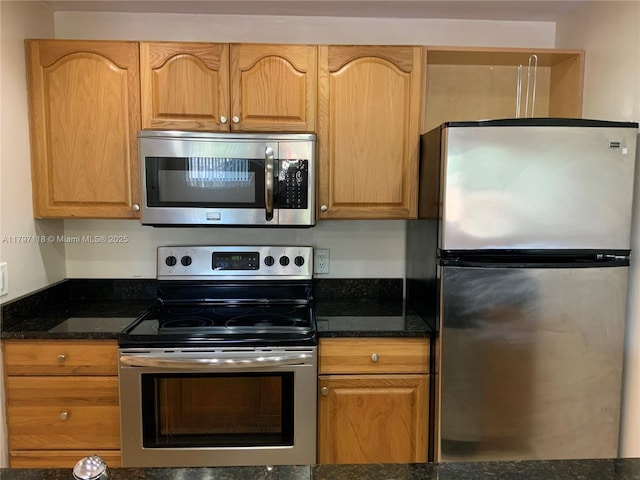 8180 Geneva Ct Unit 224, Doral, FL 33166 - kitchen featuring stainless steel appliances and dark stone counters