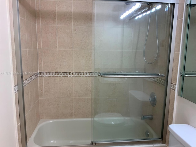 8180 Geneva Ct Unit 224, Doral, FL 33166 - bathroom featuring shower / bath combination with glass door and toilet