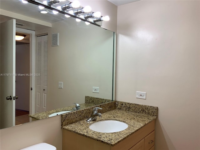 8180 Geneva Ct Unit 224, Doral, FL 33166 - half bath featuring vanity and toilet