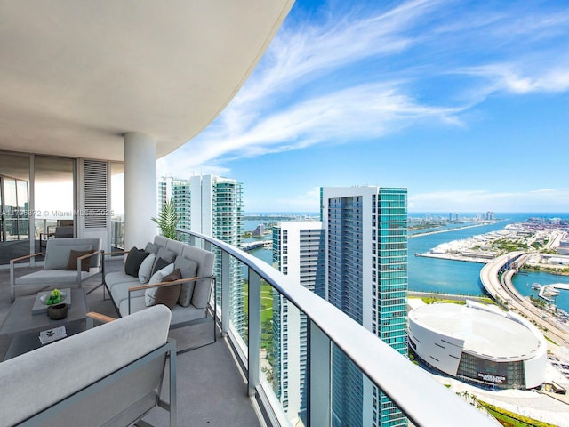 851 NE 1st Ave Unit Ph5011, Miami, FL 33132 - balcony with a water view, a view of city, and an outdoor hangout area